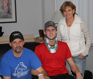 Boone with his dad, Shane, and mom, Dianna, at Craig Hospital.